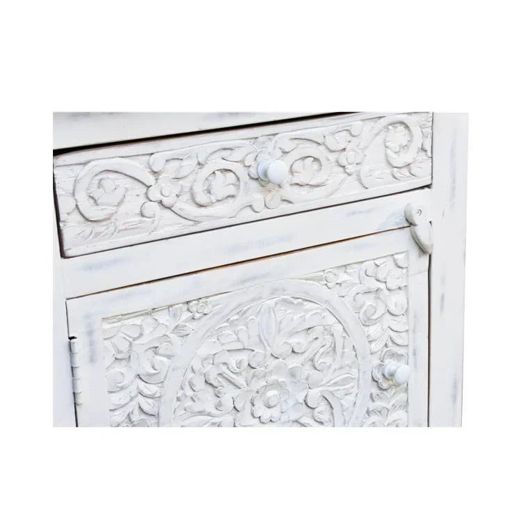 hand carved bedside table, mango wood bedside table, whitewashed bedside table, nightstand, 1 drawer bedside table, 1 door bedside table, lotus carved bedside table, medallion bedside table, indian carved furniture, bedroom bedside table, bedroom nightstand, bedside storage, handmade bedside table, artisan made nightstand, premium wood bedside table, quality wood furniture, durable nightstand, sturdy bedside table, timeless nightstand, elegant bedside table, heirloom nightstand, coastal bedside table, shabb