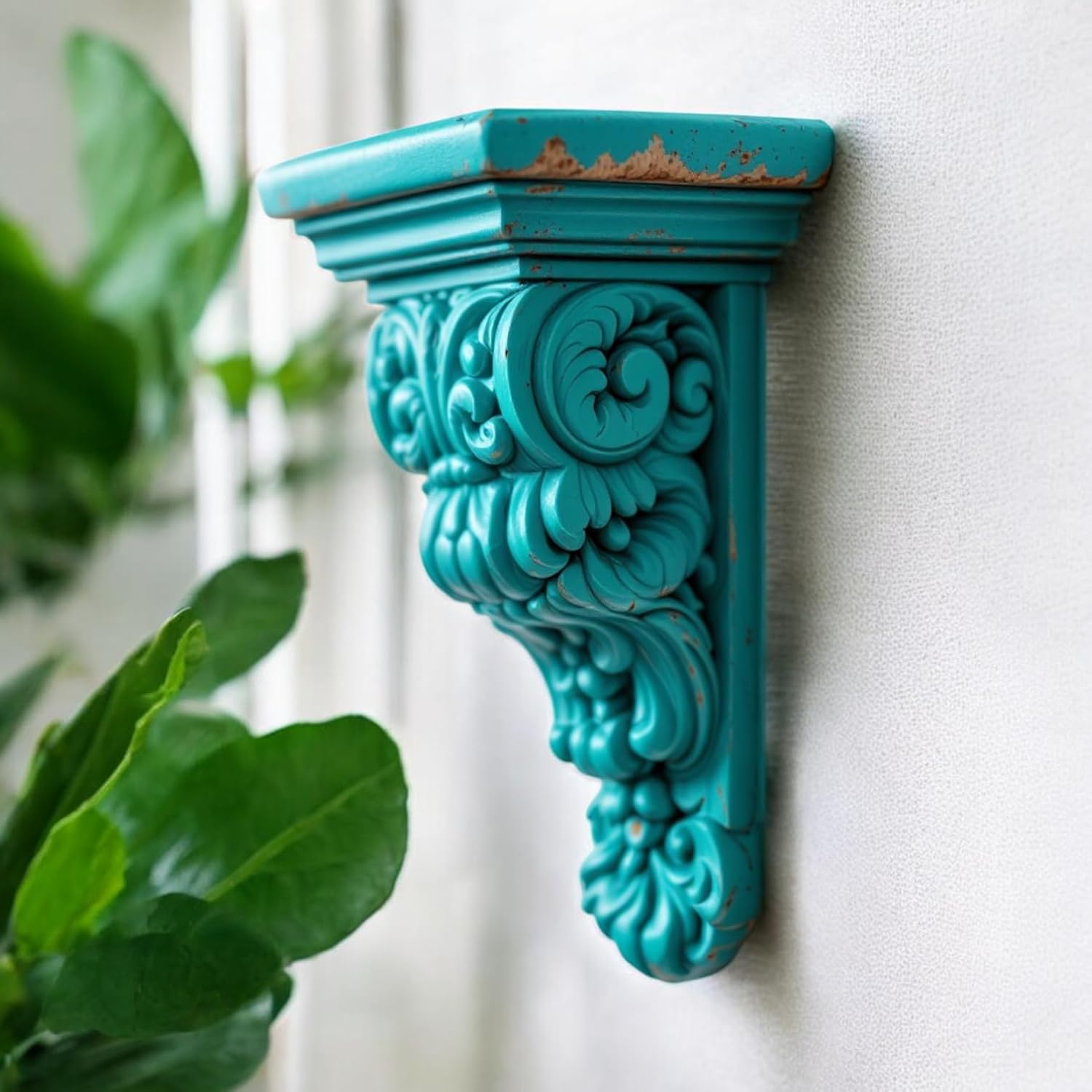 Close-up of distressed turquoise finish on wooden corbel bracket showing vintage wear