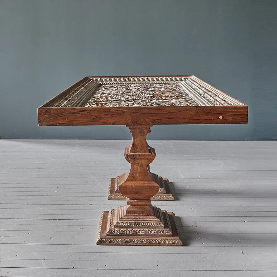 Premium mango wood dining table, handcrafted with intricate carving, farmhouse style.

