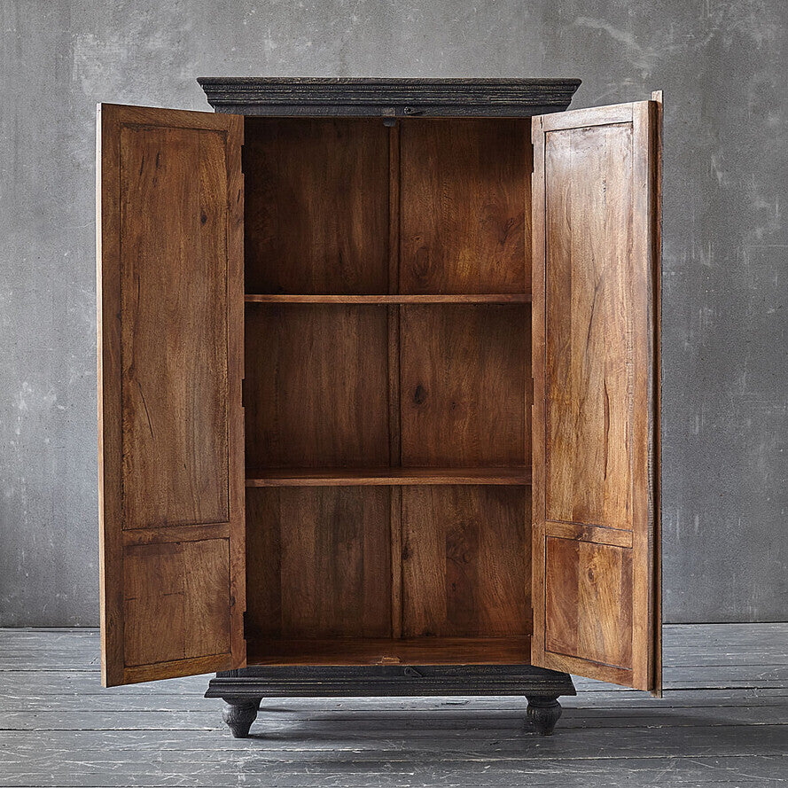 Vintage‑style grey armoire with intricate vine and floral carving on solid mango wood.

