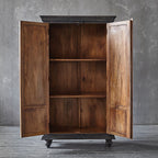 Vintage‑style grey armoire with intricate vine and floral carving on solid mango wood.

