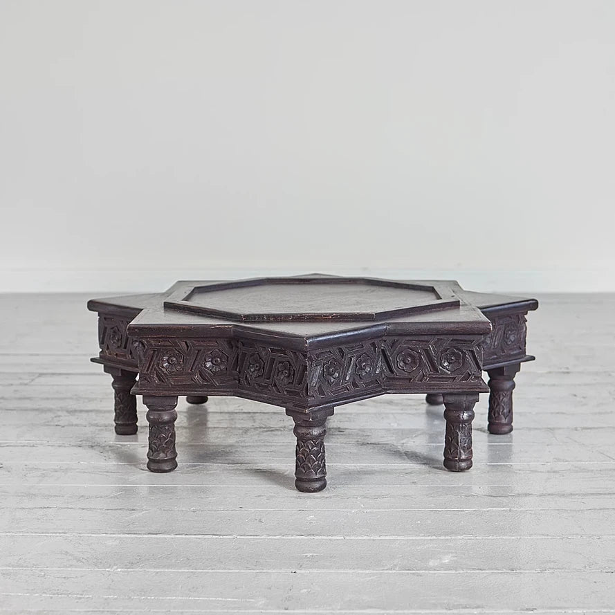 Hand‑carved mango wood low coffee table, dark walnut finish, 60 × 60 × 19 cm.

