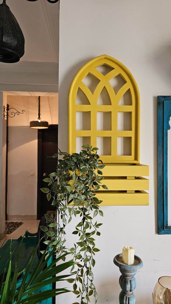 wall hanging pots, wall mounted planters, and hanging plant stands for home decor. Featuring wall mounted plant pots, wooden wall planters, and wall planters for living room, perfect for creating an indoor plant wall or unique plant wall decor. Explore wall mounted flower planters, wall plant stands, and jharokha wall decor for a vibrant, natural touch in any space. Available in various styles including wall mounted planters outdoor and hanging pots online, ideal for enhancing your living space with greener