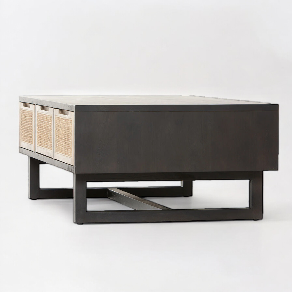 Black metal coffee table with a wooden top, adding contrast to a minimalist space.
