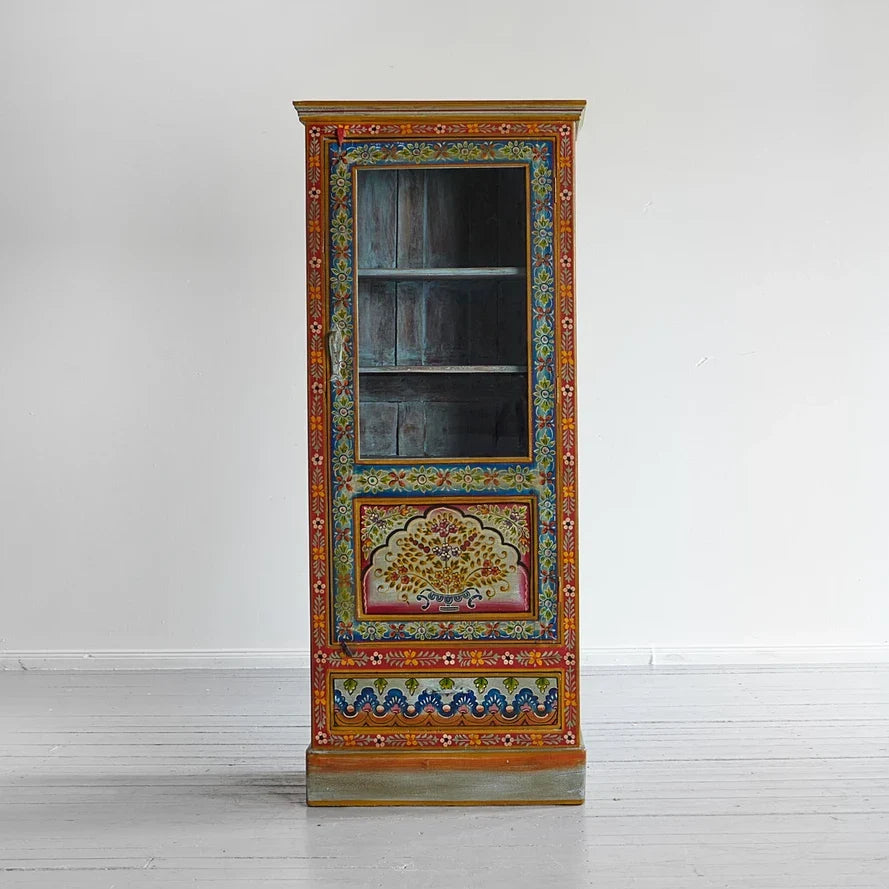 Decorative cabinet with floral patterns on a white background