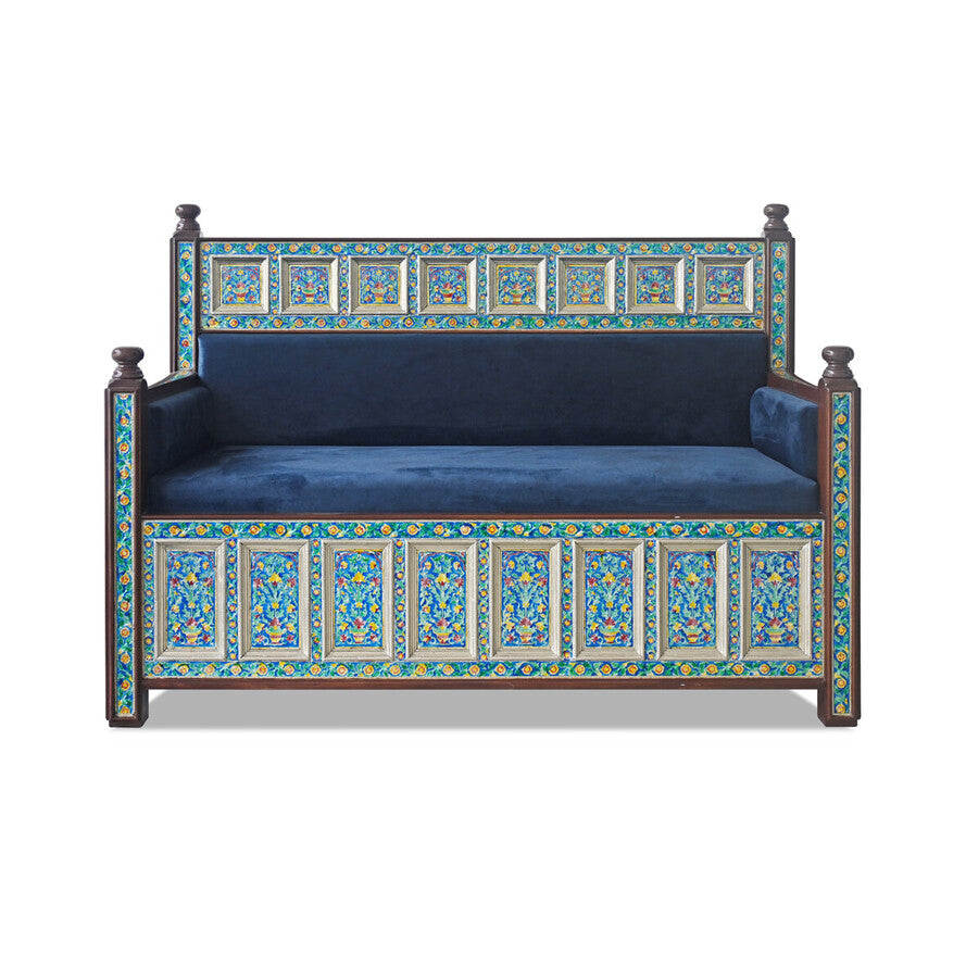 Living Furn India handcrafted two-seater sofa in Marrakesh blue, featuring intricate hand-painted floral panels on a walnut-finish mango wood frame with plush blue velvet upholstery.
