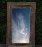 mango wood mirror, carved mirror, maharaja mirror, antique mirror, dark mirror, wall mirror, statement mirror, regal mirror, royal mirror, palace mirror, traditional mirror, handmade mirror, artisan mirror, premium mirror, quality mirror, durable mirror, elegant mirror, unique mirror, decorative mirror, focal piece mirror, handcrafted in india, sustainable mango wood, dark antique finish, bronze undertones, hand carved frame, maharaja style, layered borders, concentric borders, lattice pattern, diamond latt