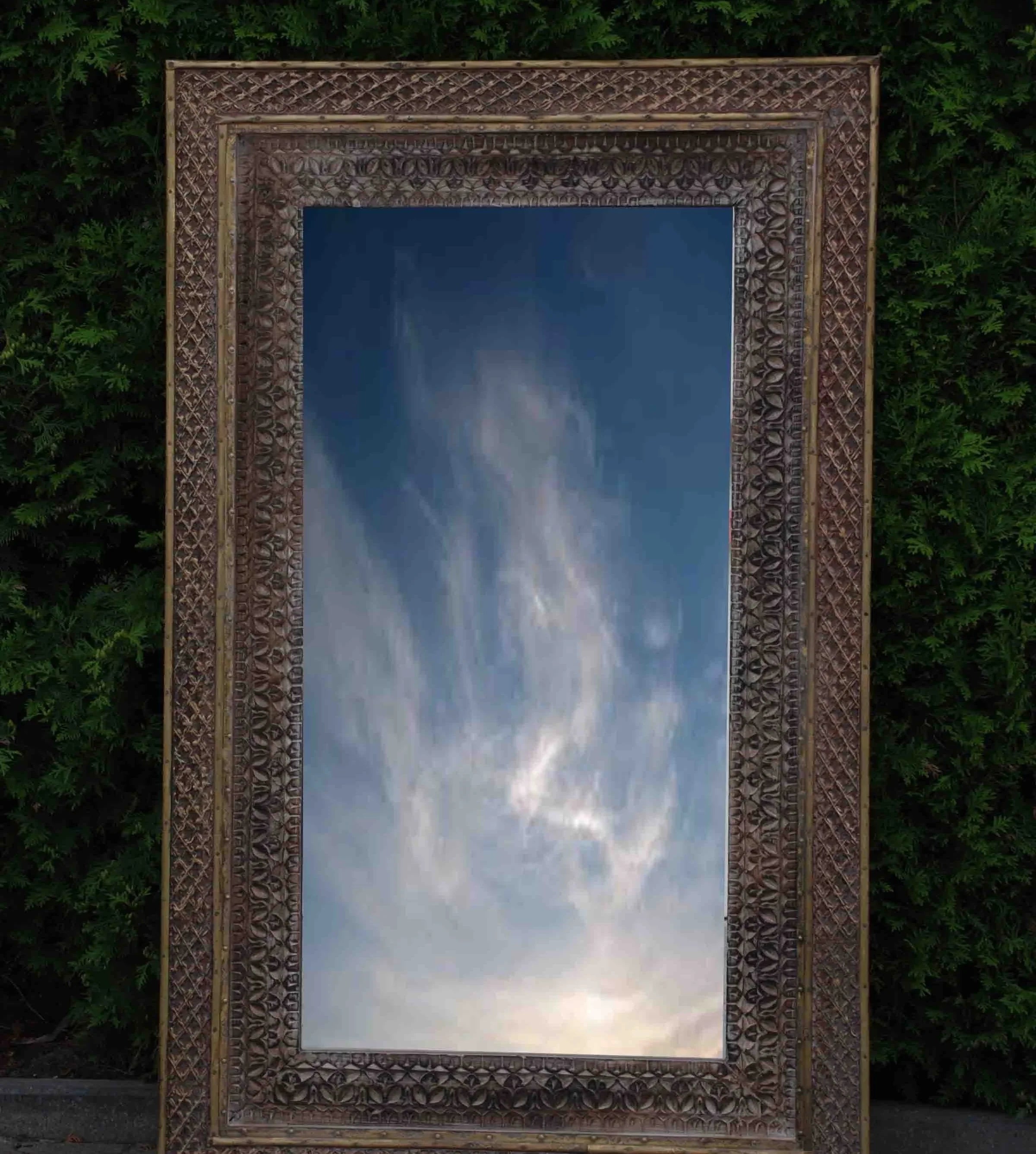 mango wood mirror, carved mirror, maharaja mirror, antique mirror, dark mirror, wall mirror, statement mirror, regal mirror, royal mirror, palace mirror, traditional mirror, handmade mirror, artisan mirror, premium mirror, quality mirror, durable mirror, elegant mirror, unique mirror, decorative mirror, focal piece mirror, handcrafted in india, sustainable mango wood, dark antique finish, bronze undertones, hand carved frame, maharaja style, layered borders, concentric borders, lattice pattern, diamond latt