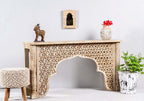 "White console table with a sleek design, perfect for brightening small spaces."
