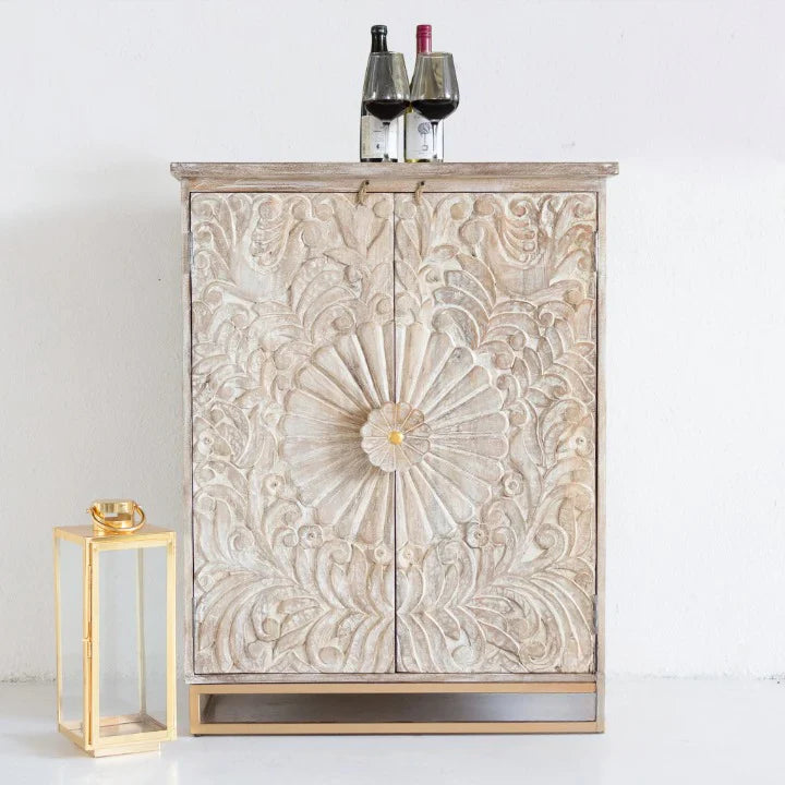 hand carved bar cabinet, mango wood bar cabinet, bar cabinet on stand, metal stand cabinet, sunburst carved cabinet, natural finish cabinet, wine cabinet, liquor cabinet, home bar cabinet, dining room bar cabinet, living room bar cabinet, storage cabinet, 2 door cabinet, drawer cabinet, handmade bar cabinet, artisan made cabinet, premium wood cabinet, quality wood furniture, durable bar cabinet, sturdy cabinet, timeless bar cabinet, elegant cabinet, statement bar cabinet, industrial style cabinet, modern ba