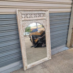 hand carved mirror, solid wood mirror, rustic white mirror, distressed white mirror, horizontal mirror, wall mirror, mehrab arch mirror, arched mirror, jali lattice mirror, entryway mirror, console mirror, living room mirror, bedroom mirror, decorative mirror, indian furniture, handmade mirror, artisan made mirror, premium wood mirror, quality mirror, durable mirror, sturdy mirror, timeless mirror, elegant mirror, statement mirror, ornate mirror, unique mirror, sculptural mirror, focal piece mirror, handcra