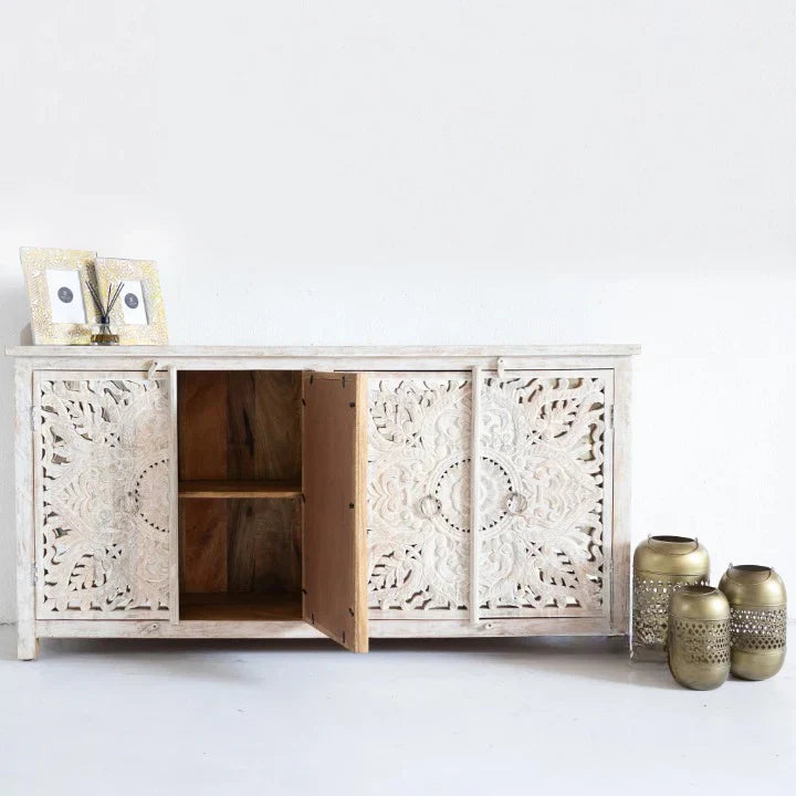 hand carved sideboard, mango wood sideboard, white wash sideboard, 4 door sideboard, openwork sideboard, lotus carved sideboard, buffet sideboard, indian carved furniture, storage sideboard, dining room buffet, living room sideboard, entryway sideboard, statement sideboard, large sideboard, handmade sideboard, artisan made sideboard, premium wood buffet, quality wood furniture, durable sideboard, sturdy buffet, timeless sideboard, elegant buffet, grand sideboard, heirloom buffet, coastal sideboard, shabby c