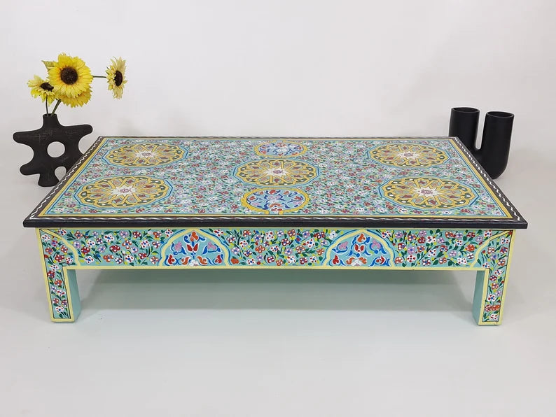 hand painted coffee table, mango wood coffee table, rectangular coffee table, tile motif table, painted wood table, colorful coffee table, bohemian table, mediterranean table, indian furniture, living room table, statement coffee table, handmade coffee table, artisan made table, premium wood table, quality furniture, durable table, sturdy table, timeless table, elegant table, ornate table, unique table, artistic table, focal piece table, handcrafted in india, sustainable mango wood, hand painted finish, sta
