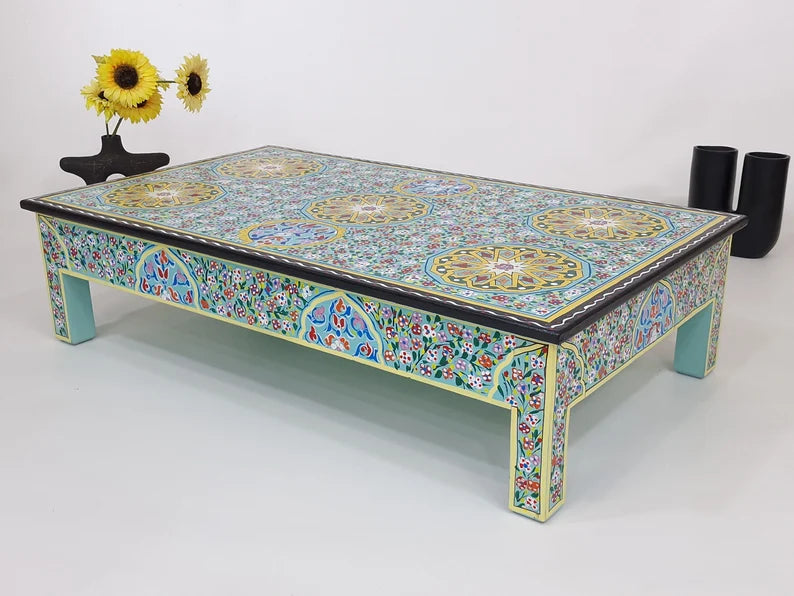 hand painted coffee table, mango wood coffee table, rectangular coffee table, tile motif table, painted wood table, colorful coffee table, bohemian table, mediterranean table, indian furniture, living room table, statement coffee table, handmade coffee table, artisan made table, premium wood table, quality furniture, durable table, sturdy table, timeless table, elegant table, ornate table, unique table, artistic table, focal piece table, handcrafted in india, sustainable mango wood, hand painted finish, sta