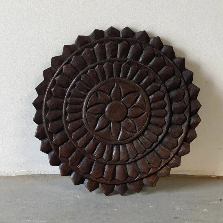 hand carved wall panel, solid wood wall art, round wall panel, circular wall art, dark brown panel, lotus medallion panel, mandala wall art, radiating lotus, indian furniture, entryway wall art, meditation wall decor, small wall panel, decorative wall panel, handmade wall art, artisan made panel, premium wood art, quality wood decor, durable wall panel, solid wood panel, sturdy wall art, timeless wall art, elegant panel, statement wall decor, accent wall art, unique wall art, sculptural panel, focal piece a