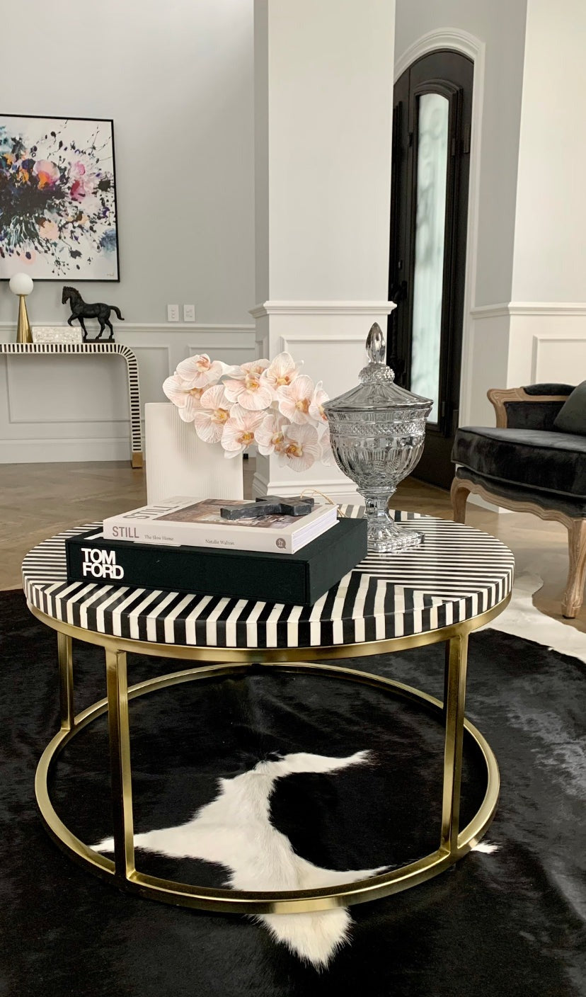 "Bone inlay coffee table featuring luxurious patterns and unique detailing."
