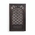 Brown finished Indian jali carved mango wood wall panel, 150 × 90 cm.

