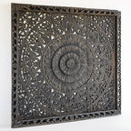 "Close-up of artisan distressing showing black finish with raw wood texture highlights"

