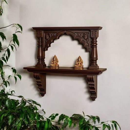 Jodhpur artisan dark wood carved archway wall altar, featuring intricate temple-inspired carvings. Ideal for displaying sacred items or antique collectibles.