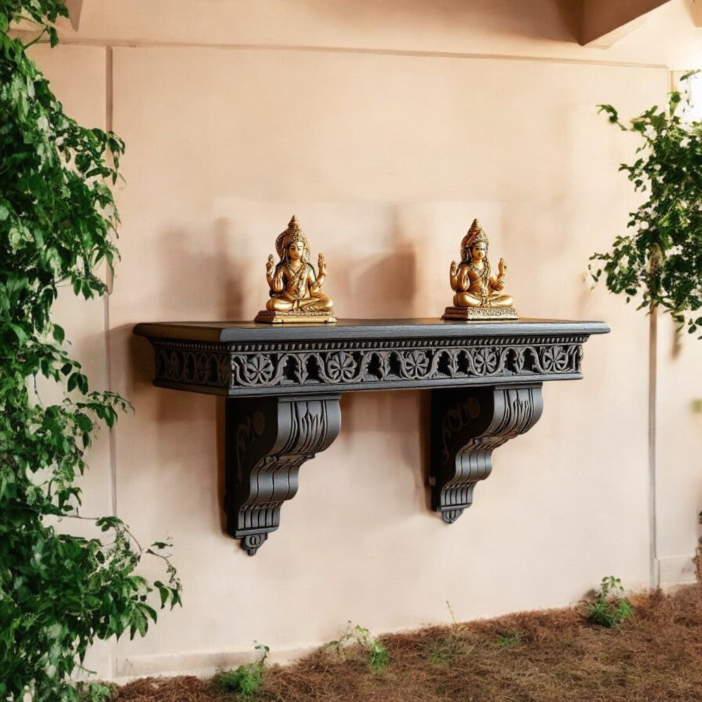 J.L.HOME DECOR hand-carved dark wood pooja ledge, featuring intricate corbels and frieze. Ideal for displaying sacred items or antique collectibles.