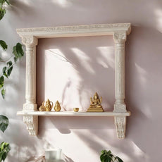 Jodhpur hand-carved white-washed archway wall shelf with columns and corbels. Handcrafted in Jodhpur, Rajasthan. Ideal for pooja display and antique home decor.