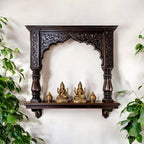 Jodhpur hand-carved dark wood archway pooja shelf with columns and corbels. Handcrafted in Jodhpur, Rajasthan. Ideal for pooja display and antique home decor.
