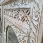 hand carved mirror, solid wood mirror, rustic white mirror, distressed white mirror, horizontal mirror, wall mirror, mehrab arch mirror, arched mirror, jali lattice mirror, entryway mirror, console mirror, living room mirror, bedroom mirror, decorative mirror, indian furniture, handmade mirror, artisan made mirror, premium wood mirror, quality mirror, durable mirror, sturdy mirror, timeless mirror, elegant mirror, statement mirror, ornate mirror, unique mirror, sculptural mirror, focal piece mirror, handcra
