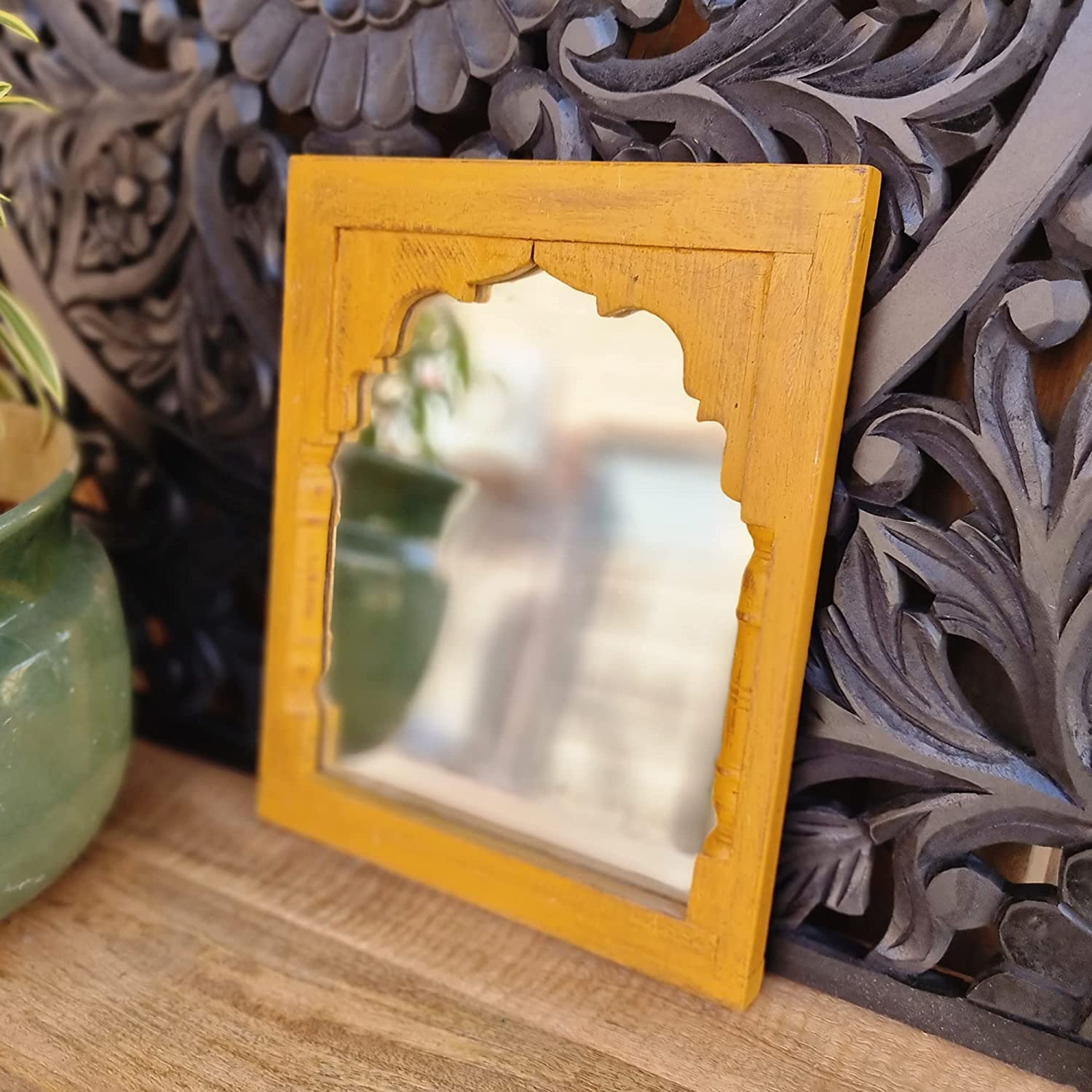 Explore an extensive range of wall mirror designs, including wall mirror designs for living rooms, jharokha mirrors, carved wooden mirror frames, and decorative mirrors. Discover pink mirrors, small decorative mirrors, makeup hand mirrors, and mirror art wall decor to enhance any space. Perfect for bedrooms, bathrooms, and living rooms, our collection includes vintage mirrors, rustic frames, modern jharokhas, and aesthetic wall mirrors. Shop online for wooden jharokhas, carved mirror frames, and unique mirr
